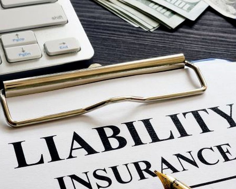 Liability insurance paperwork on a clipboard